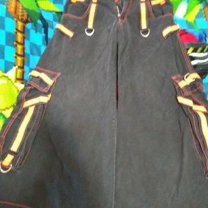 Orange and black tripp pants.